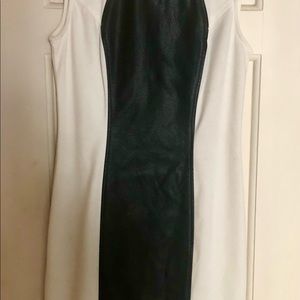 Hip faux black leather/white dress. Worn twice.  Fits true to size